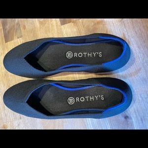 Rothy’s The Flat Black with Blue Halo.          Size 10.5W .